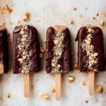 Craving protein packed summer treats? Beat the heat with our top Frozen Peanut Butter Protein Pops that fuel workouts and satisfy sweet cravings in one delicious bite. Discover now!