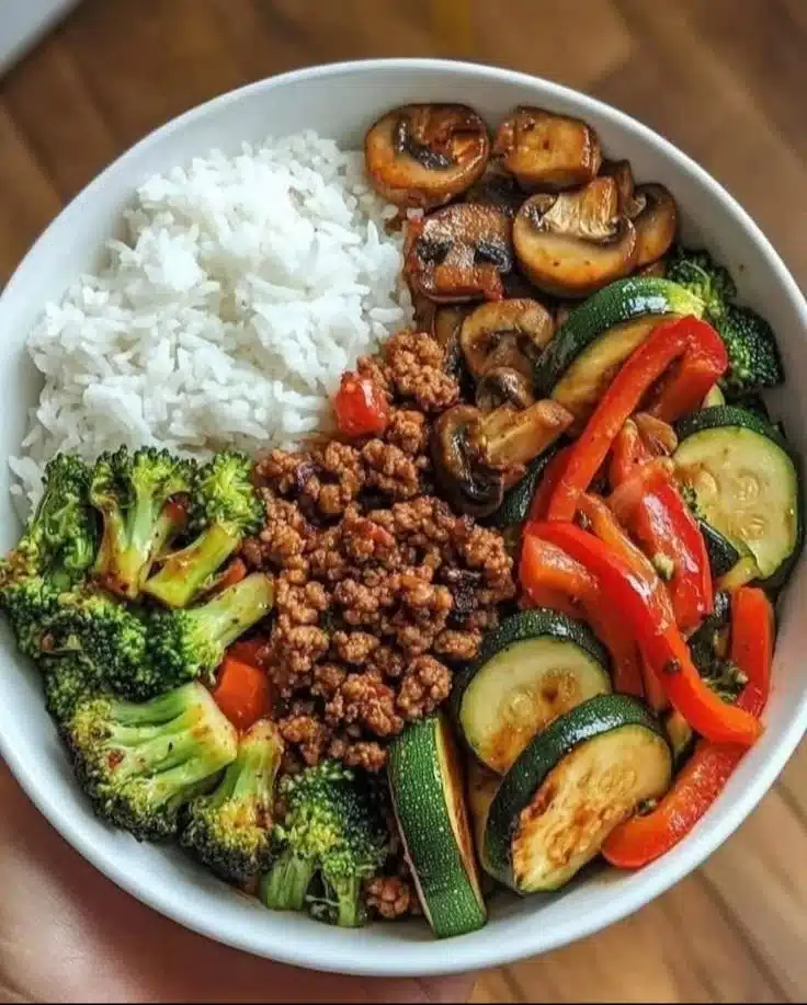 Healthy ground beef and veggie bowl with colorful vegetables