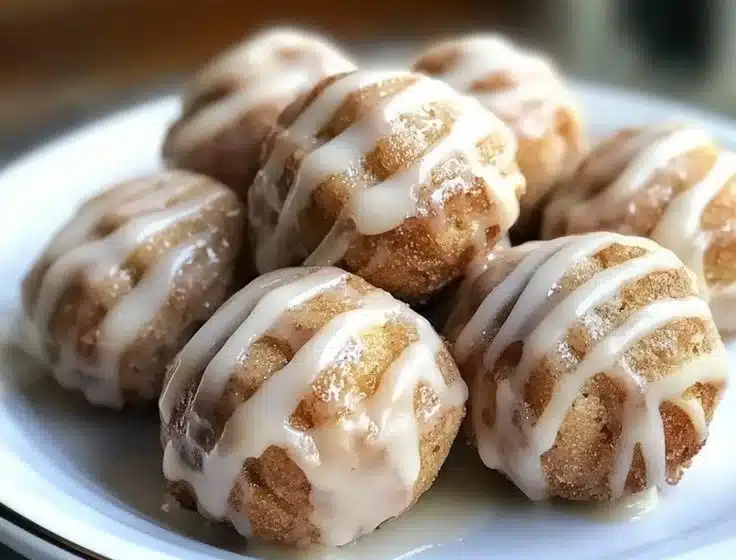 Homemade cinnamon roll protein bites ready to enjoy as a healthy snack.
