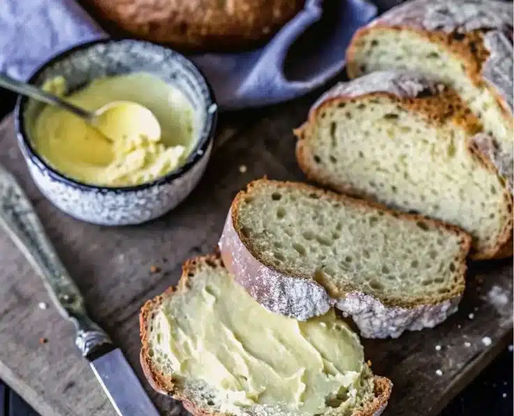 Loaf of Traditional Irish Soda Bread with crusty exterior and soft interior