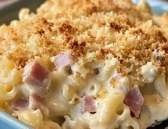 Delicious Chicken Cordon Bleu Casserole topped with cheese and herbs