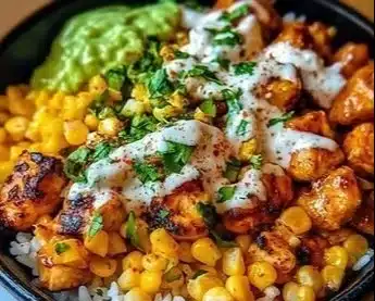 Delicious Street Corn Chicken Rice Bowl with grilled chicken and colorful toppings